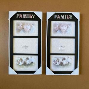 Two Fetco Family Photo Frames